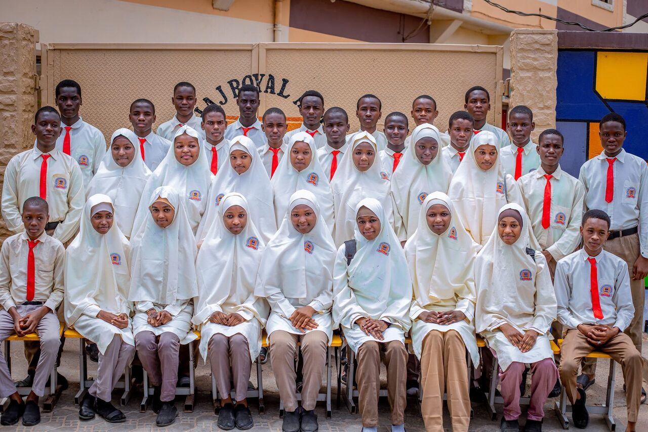 Students studying together around a table in an AcmeLearn study hall